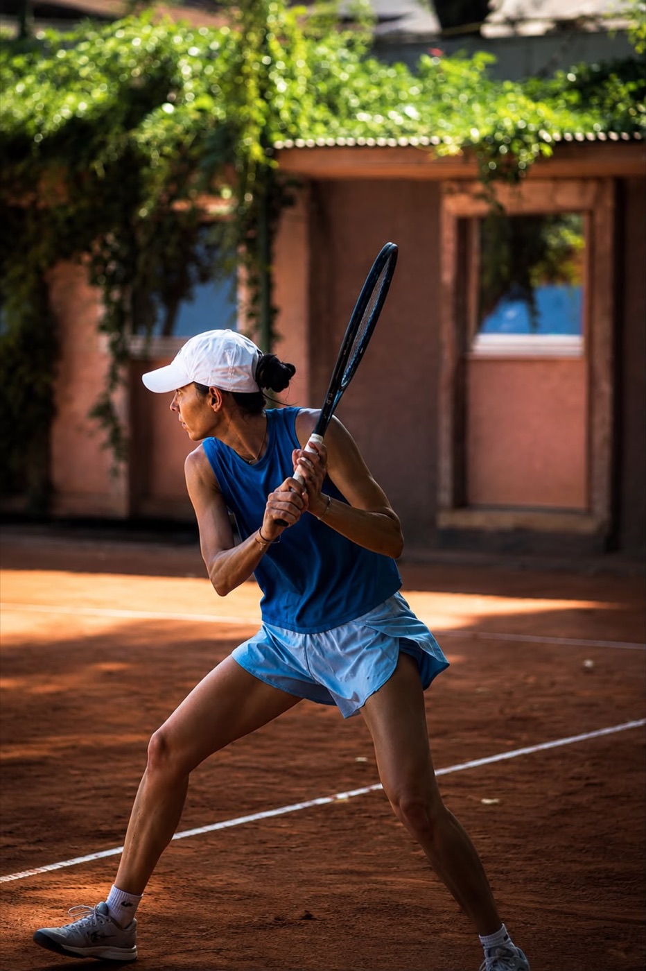Jucătoare la antrenament de performanță, Tennis Club by the Lake